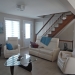 salon-peinture-coussin-jetée-bois-franc